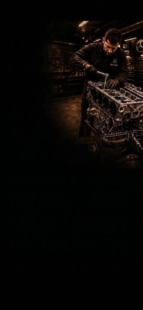 Jaguar technician rebuilding an engine block