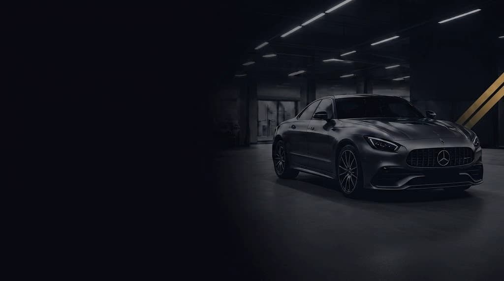 Jaguar AMG GT in a dark showroom